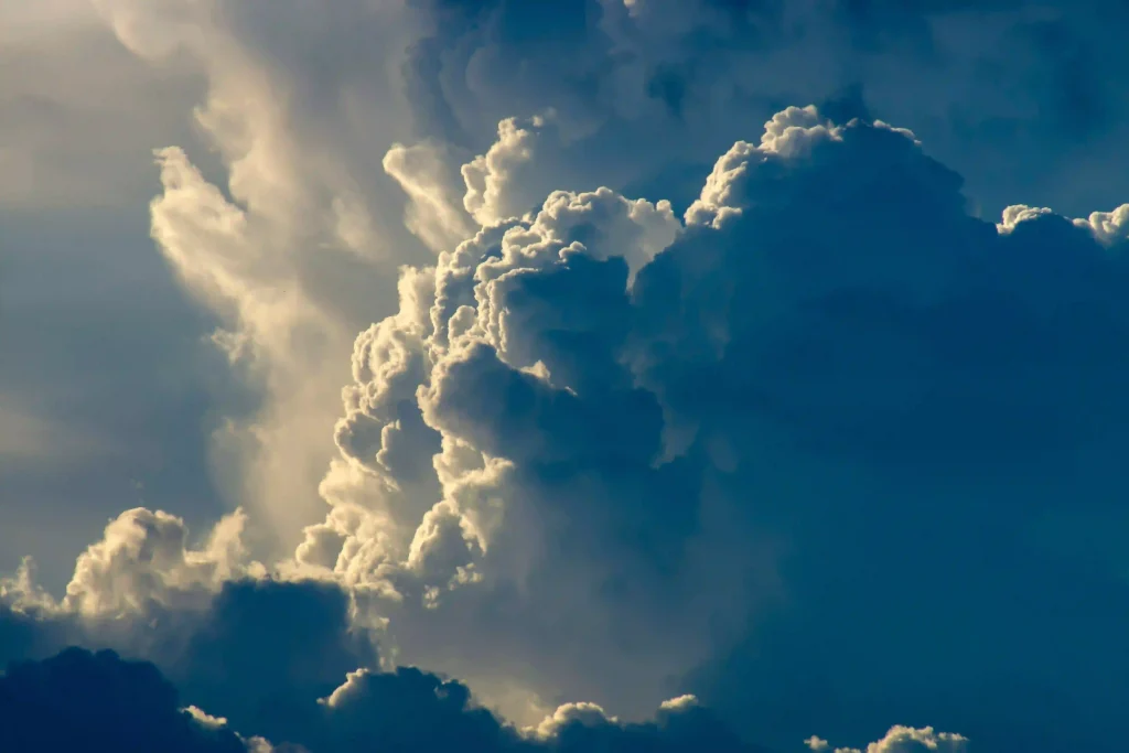 Dramatic cumulus clouds in a blue sky