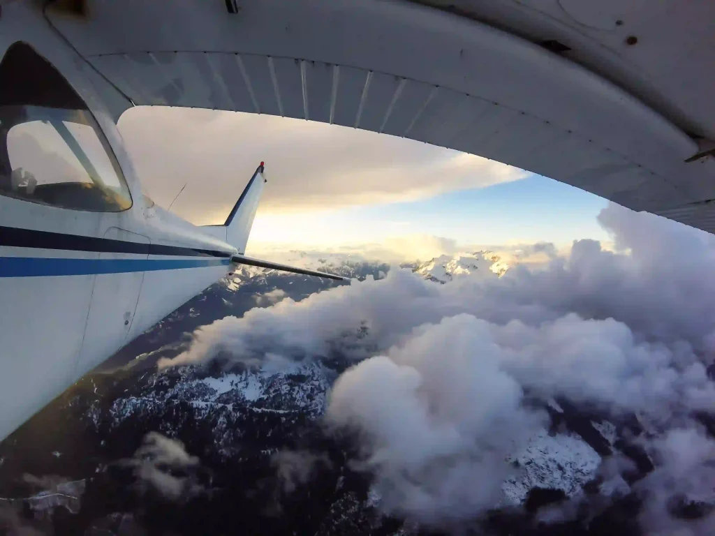 AAG Airplane flying over the clouds